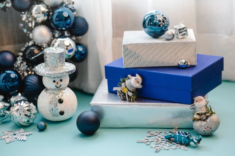 blue and white boxes near snowman